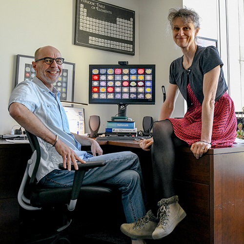 Dr. Dick and Dr. Dartois in an office