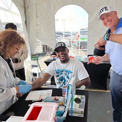 Participant receiving a health screening at a community event